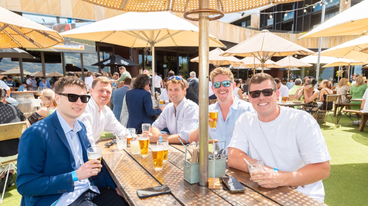 Mates sharing beers on the terrace